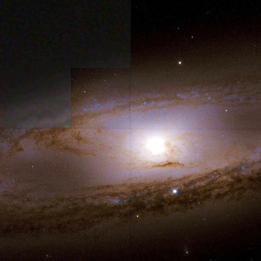 Photographie de la galaxie spirale M65