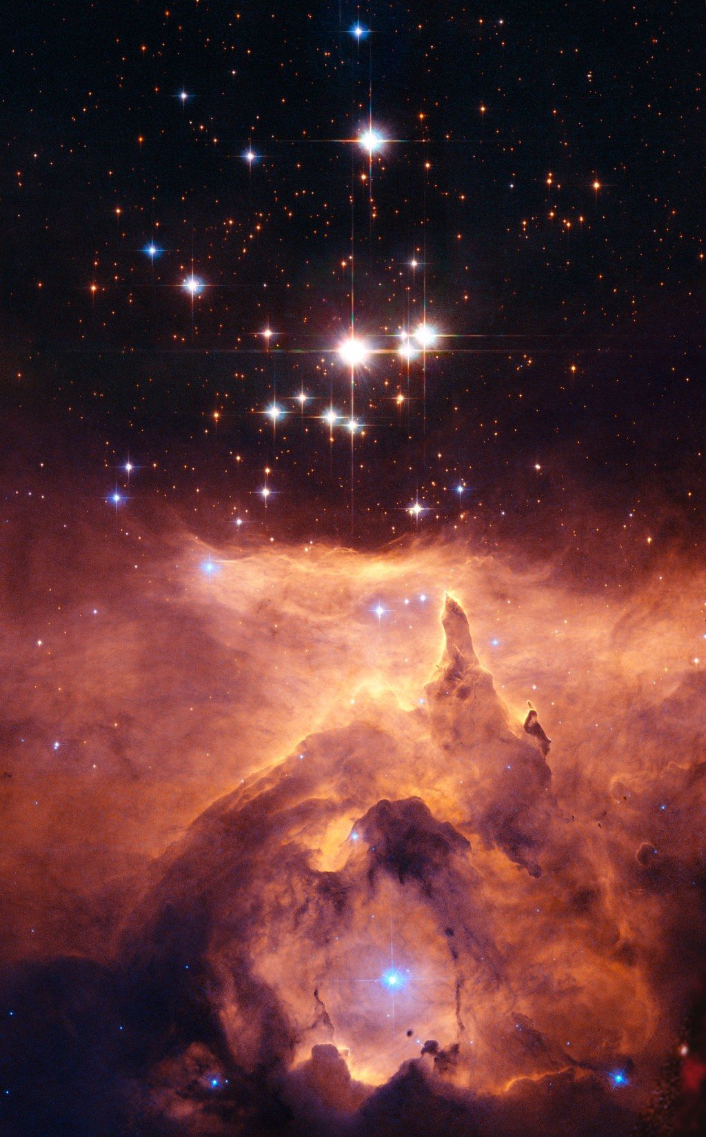 L'amas d'étoiles Prismis 24 situé dans la nébuleuse d'émission lumineuse NGC 6357